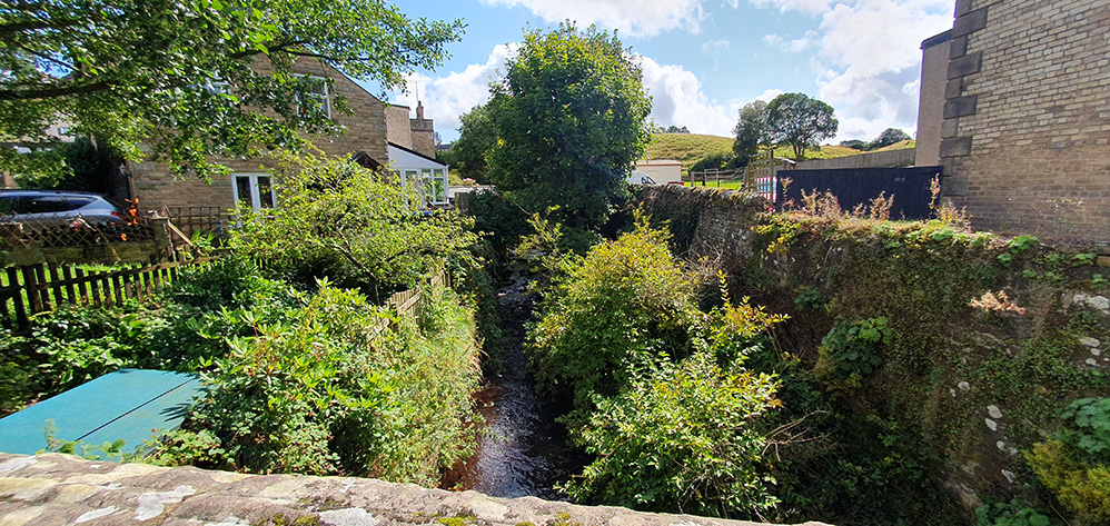 In Gilsland, the Poltross Burn forms the border between Northumberland (left) and Cumbria (right)