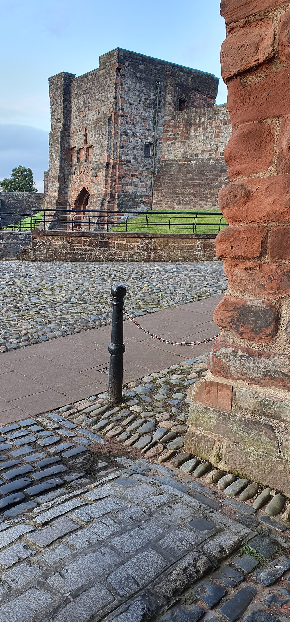 Carlisle Castle barbican and outer Bailey pictured from the castle entrance gateway 
