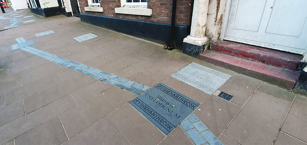 Special paving stones stones in Carlisle's Castle street map out Hadrian's Wall and give the names of Roman forts along its course - these two refer to the forts at Stanwix and Carlisle