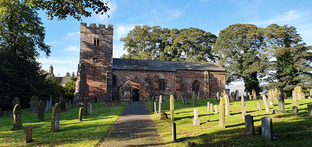 Kirkby Thore church of St Michael. Notice Cross Fell to the right through the trees